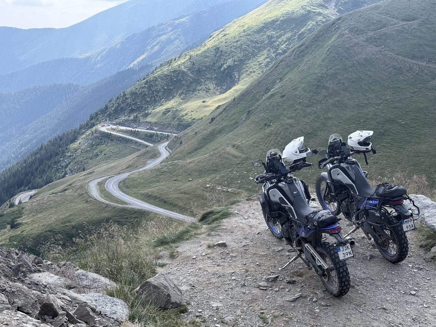 Two motorcycles parked above the southern hairpins of the Transfăgărășan